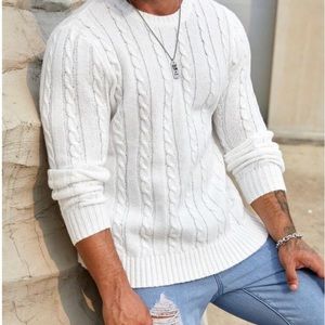 White cable-knit sweater
